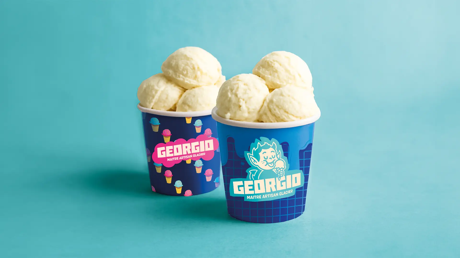 Maquette de rebranding pour la marque de glace Georgio, présentant un pot de glace et une boîte à emporter avec le nouveau logo et un design minimaliste.